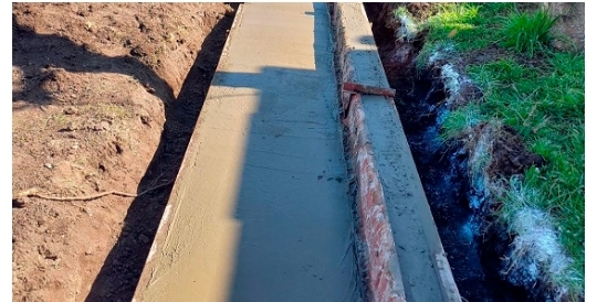 Obra de cordón cuneta en Guerrico